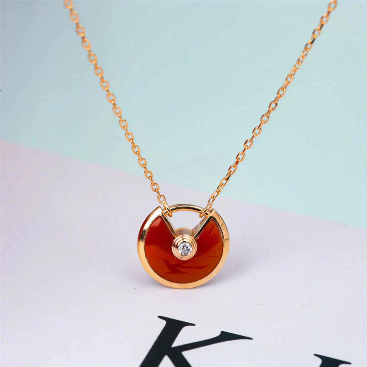 CC AMULETTE GOLD CARNELIAN ONYX NECKLACE