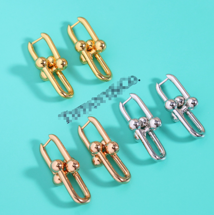 CCTF HORSESHOE BUCKLE EARRINGS